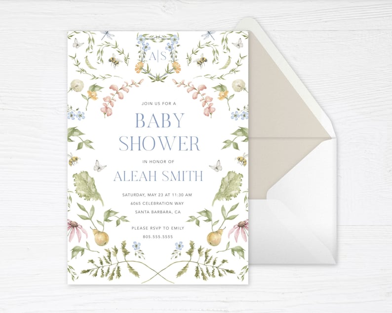 May include: A floral baby shower invitation with a watercolor design featuring a wreath of flowers, leaves, and butterflies. The text reads "Join us for a Baby Shower in honor of Aleah Smith. Saturday, May 23 at 11:30 AM, 6065 Celebration Way, Santa Barbara, CA. Please RSVP to Emily 805.555.5555."