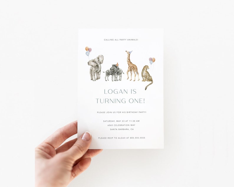 May include: A birthday party invitation with a watercolor illustration of an elephant, zebra, giraffe, and leopard. The text reads "Calling all party animals! Logan is turning one! Please join us for his birthday party! Saturday, May 23 at 11:30 am 6065 Celebration Way Santa Barbara, CA Please RSVP to Aleah at 805.555.5555"