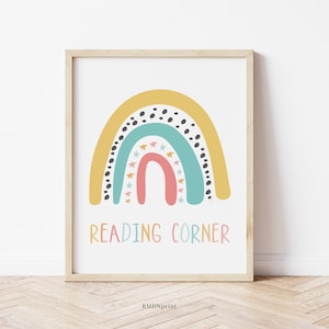 May include: A colorful rainbow with black polka dots and stars, with the text "Reading Corner" underneath. The rainbow is yellow, blue, green, and pink.