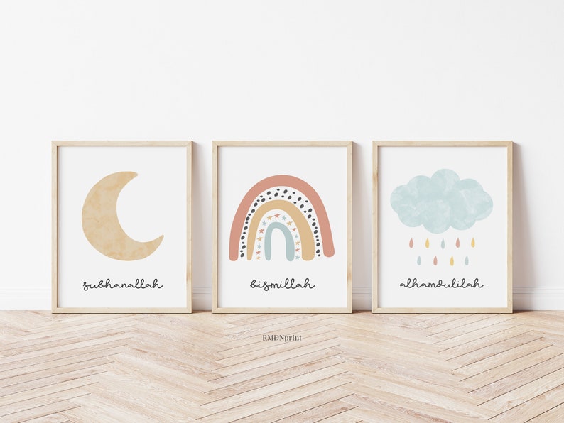 May include: Three framed art prints with a light wood finish. Each print features a different design: a crescent moon, a rainbow, and a cloud with raindrops. The words "subhanallah", "bismillah", and "alhamdulillah" are written below each image.