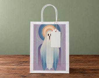 Bolsa de regalo con diseño de fantasma Art Déco en tonos pastel y etiqueta.
