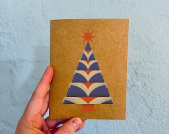 Juego de tarjetas de felicitación en caja con diseño de árbol de Navidad rojo y azul estilo Art Déco