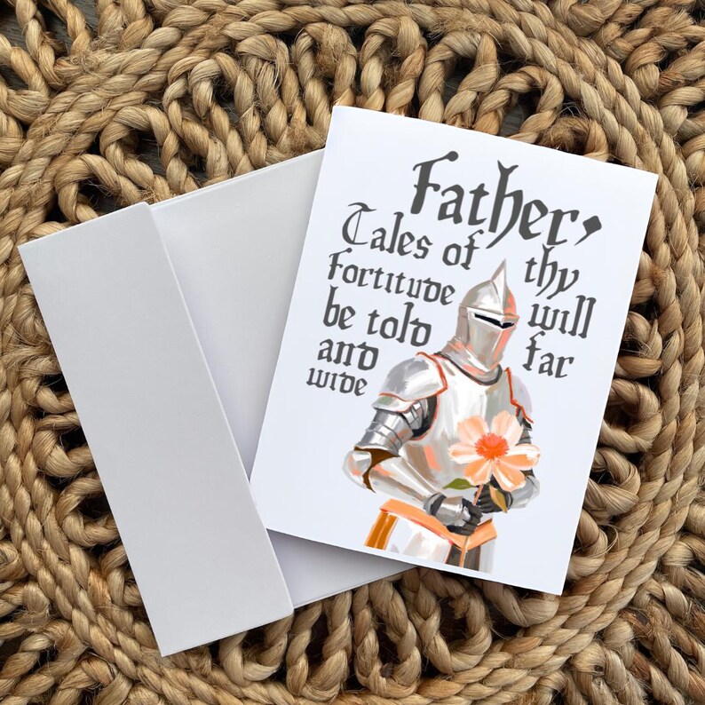 May include: A white card featuring a knight in silver armour holding a pink flower. The card reads "Father, Tales of thy fortitude will be told far and wide."
