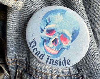 Botón de pin con calavera azul neón "Dead Inside"