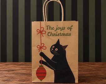 Bolsa de regalo de lujo con diseño de gato negro de mediados de siglo, impresa en papel kraft natural con etiqueta de regalo.
