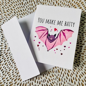 Spooky romantic card - “You make me batty” cute flying bat with hearts - girlie Halloween card - pink Halloween card - Halloween love card