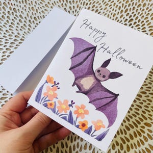 Happy Halloween bat with purple and orange flowers blank inside note cards - happy Halloween cards - floral Halloween colors bat card
