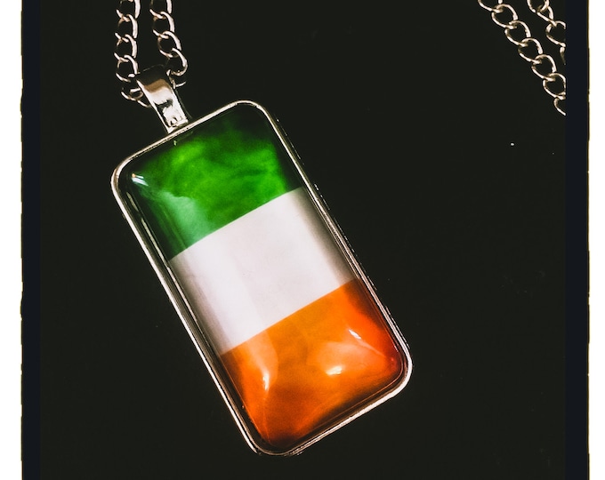 Heavy tri- colour pendant.