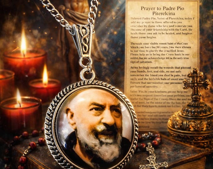 Padre Pio silver pendant with prayer.