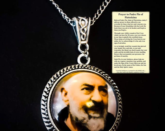Padre Pio silver pendant with prayer.