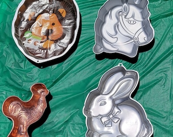 Vintage Cake Tins mostly Wilton for decor, holiday decor, or cake use! Lion, Horse, Bunny, and a Copper Rooster Cake Pan