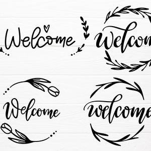 May include: Four different welcome signs with black calligraphy and floral designs. The first sign has a simple floral design with a heart above the word "welcome". The second sign has a wreath of leaves around the word "welcome". The third sign has a simple floral design with tulips on either side of the word "welcome". The fourth sign has a wreath of leaves around the word "welcome".