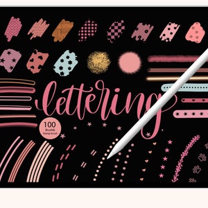 May include: A digital tablet screen displaying a collection of 100 pink, gold, and white brush and stamp brush designs for lettering. The text "lettering" is written in pink cursive script. The text "100 Brush & Stamp Brush" is written in white.
