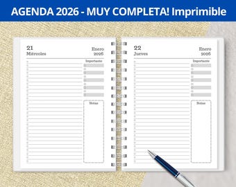 May include: A white planner with a black and gray spiral binding. The planner has two pages open, each with a calendar date, day of the week, and space for writing. The text on the pages reads "21 Miércoles Enero 2026" and "22 Jueves Enero 2026".