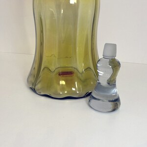 Vintage Blenko Amberina Art Glass Bell Shaped Decanter with Stopper, Joel Philip Myers, is in a retro design. The pontil mark shows authenticity of the blown glass.