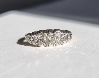 Fabulous Georgian or early Victorian style engagement ring with Old mine cut diamonds, silver and gold. 9-stone silver collet diamond ring