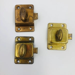 May include: A set of three ceramic mugs with a speckled, matte finish. The mugs are in shades of cream, light gray, and dark gray. Each mug has a simple, minimalist design, perfect for coffee or tea.