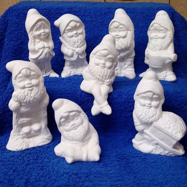 Set of 8 small ceramic bisque gnomes