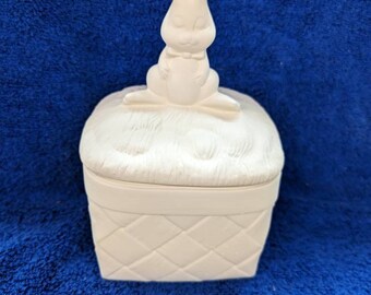 Rabbit on square weaved basket