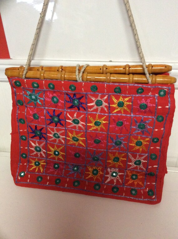 Embroidered mirrored bag