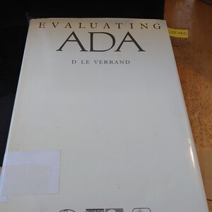 May include: A white book with the title "EVALUATING ADA" and the author "D LE VERRAND". The book is published by North Oxford Academic.