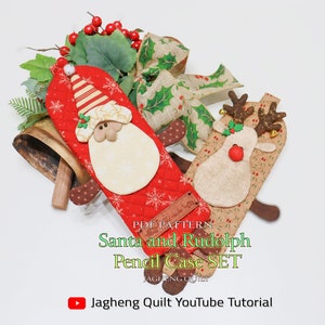 May include: A set of two Christmas-themed pencil cases. One is red with a Santa Claus design, and the other is tan with a reindeer design. The text "Santa and Rudolph Pencil Case SET" is visible. A YouTube tutorial is also mentioned.