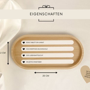May include: A wooden serving tray with four white labels that say "Each tablet is unique", "High-quality beech wood", "100% food safe", and "Versatile use". The tray is 12 inches long and 25 inches wide.