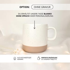 May include: A white ceramic mug with a speckled design and a tan base. The mug has a handle and the text "OPTION: OHNE GRAVUR" is visible. The text "DU ERH&Auml;LTST UNSERE TASSE BLANKO OHNE SPRUCH ODER PERSONALISIERUNG" is also visible.