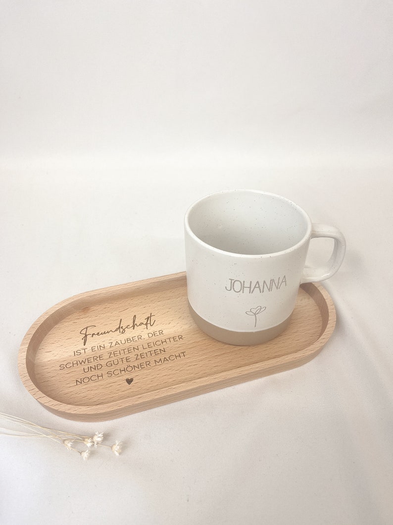 May include: A wooden tray with the text "Friendship is a magic that makes hard times easier and good times even better" engraved on it. A white mug with the name "Johanna" is on the tray.
