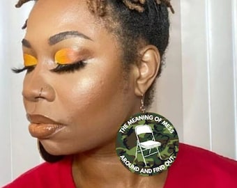 The meaning of mess around and find out earrings, Alabama brawl, folding chair earrings, Montgomery brawl, black history, camouflage earring