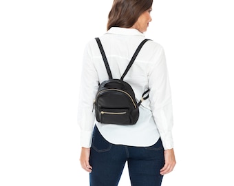 Mochila pequeña de cuero: bolso de viaje minimalista con asa superior