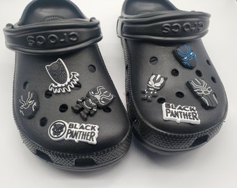 black power croc charms