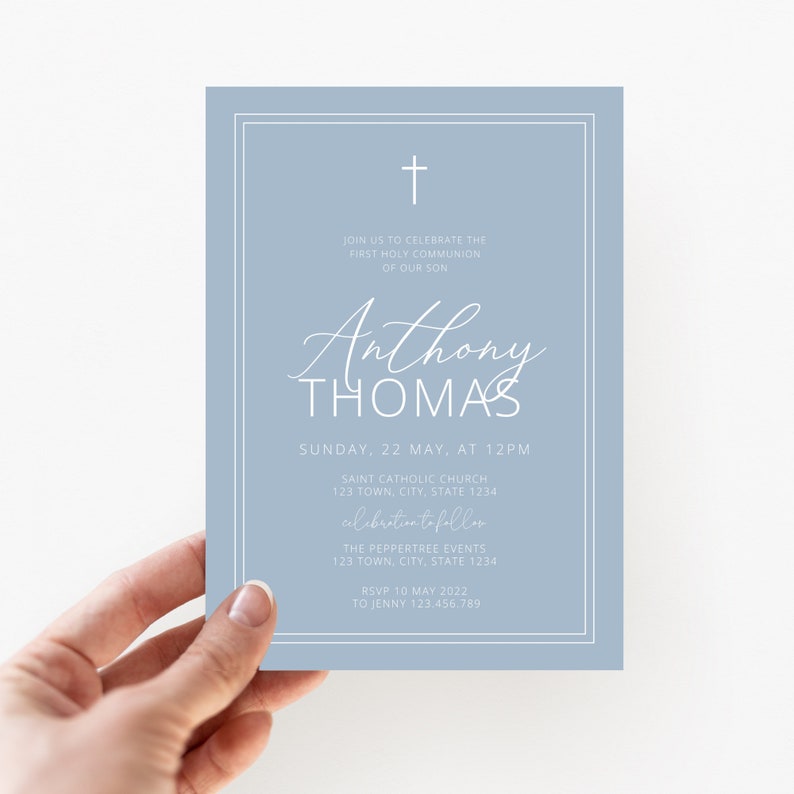 May include: A light blue invitation card with a white cross at the top. The text reads "Join us to celebrate the First Holy Communion of our son Anthony Thomas. Sunday, 22 May, at 12PM. Saint Catholic Church 123 Town, City, State 1234. Celebration to follow. The Peppertree Events 123 Town, City, State 1234. RSVP 10 May 2022 to Jenny 123.456.789"