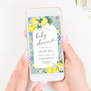 May include: A digital invitation for a baby shower with a lemon and floral design. The invitation features a blue and yellow tiled border and the text "Please join us for a baby shower" with the date and time of the event.