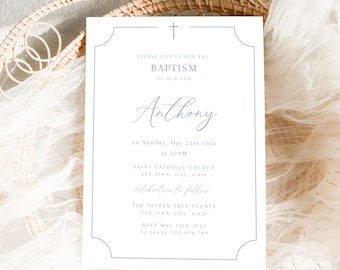 May include: A white invitation card with a light blue border and text. The card reads "PLEASE JOIN US FOR THE BAPTISM OF OUR SON Anthony" with event details. A cross is at the top. The card is on a white lace cloth.