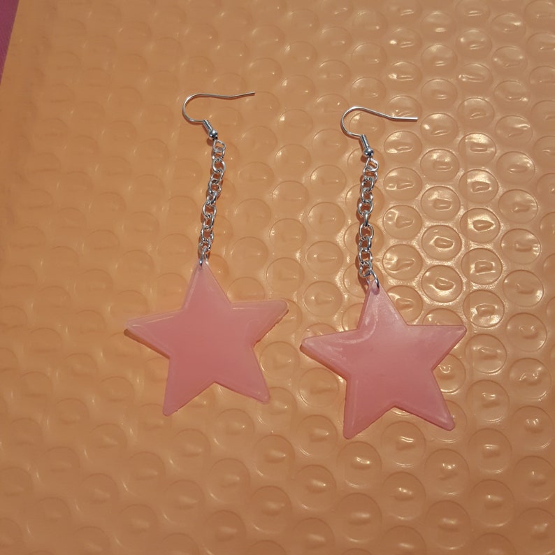 glow in the dark star earrings!