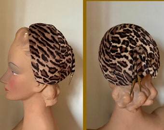 1950s leopard clamper hat with bead detail on the back.