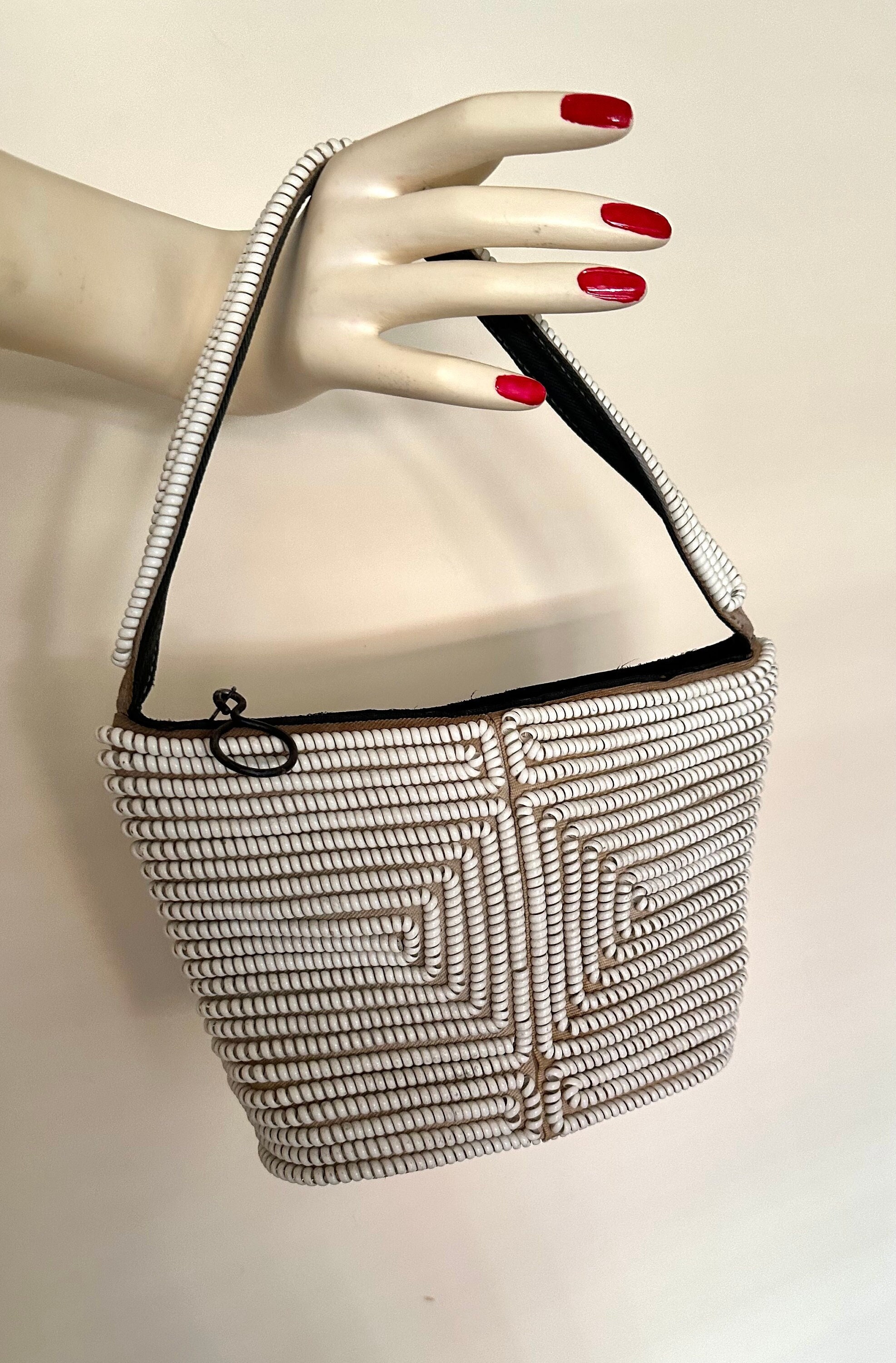 Small phone cord best sale purse