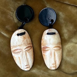 Novelty Tiki earrings.