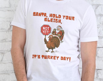 Humorous Holiday Crossover Tee: Santa Celebrates Thanksgiving Turkey Day Jersey Short Sleeve Shirt