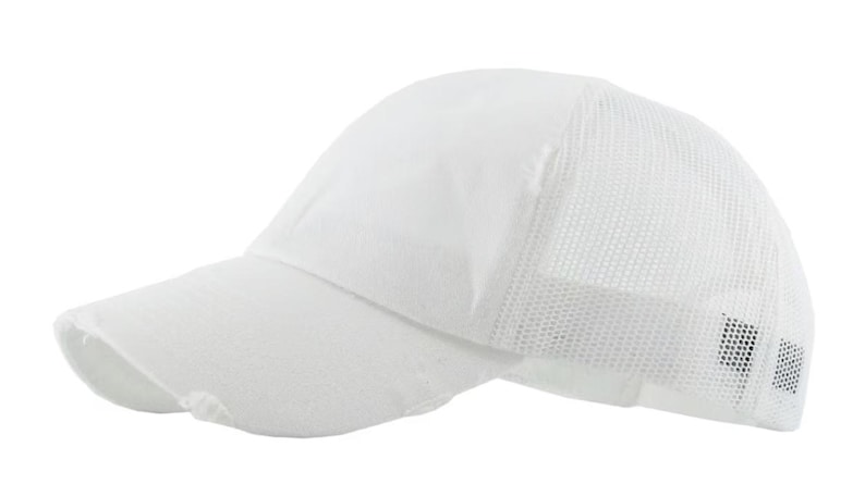 May include: A solid white baseball cap featuring a distressed, frayed brim and a breathable mesh back panel. The cap is constructed with a structured front crown and a curved visor, showcasing a clean, monochromatic design throughout the entire piece.