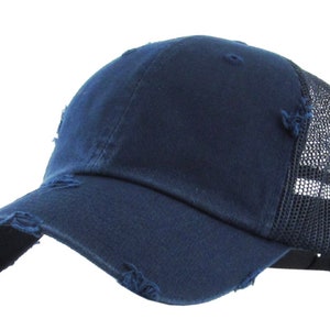 May include: A navy blue baseball cap with a distressed appearance. The front panels and peak are solid, while the back has a black mesh for ventilation. The cap has a curved peak and a classic six-panel design.
