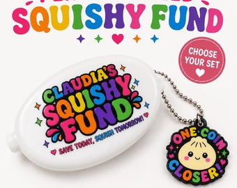 May include: A white oval squeeze coin purse featuring the colorful text "CLAUDIA'S SQUISHY FUND" and "SAVE TODAY, SQUISH TOMORROW!" with a black circular charm attached by a silver ball chain that reads "ONE COIN CLOSER!" with a cartoon dumpling face.
