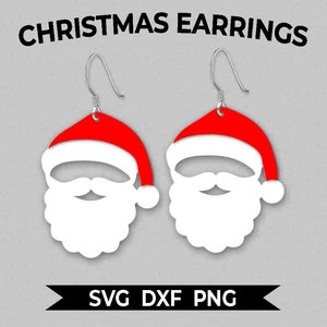 May include: A pair of Christmas earrings featuring a white Santa Claus beard and moustache with a red Santa hat. The earrings are made of white and red acrylic.