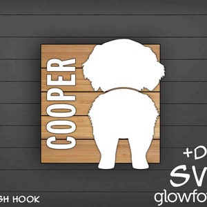 May include: A wooden sign with the name "COOPER" in white text. A white silhouette of a dog's rear end is on the sign. The sign has a leash hook and the text "LEASH HOOK" is below the sign. The text "+DXF SVG glowforge" is in the bottom right corner of the image.