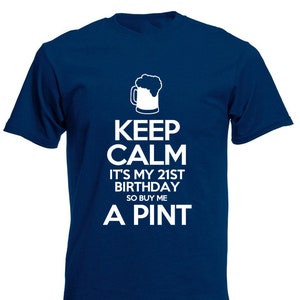 May include: A blue t-shirt with white text that reads "Keep Calm It's My 21st Birthday So Buy Me A Pint". A beer mug icon is above the text.