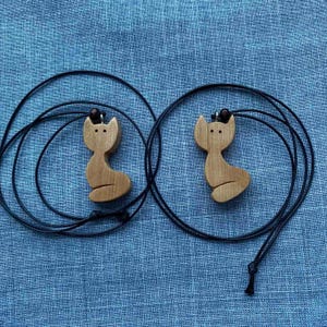 Wooden carved cat pendant Handmade animal necklace Natural wood jewelry Gift for cat lover Cute rustic feline accessory