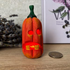 Carved wood Halloween pumpkin with glowing eyes Spooky rustic Jack lantern decor Fall table centerpiece Halloween Witch gift