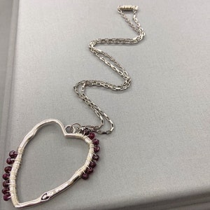 Hammered Silver Heart Necklace: Wire Wrapped Garnet Pendant
