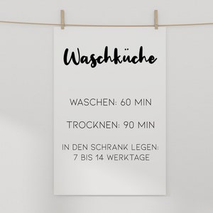 May include: A white sign with black text that reads "Waschk&uuml;che" (German for laundry room). The sign also includes instructions for washing and drying laundry, as well as how long it takes to put laundry away: "Waschen: 60 Min" (Wash: 60 minutes), "Trocknen: 90 Min" (Dry: 90 minutes), "In den Schrank legen: 7 bis 14 Werktage" (Put in the closet: 7 to 14 working days).